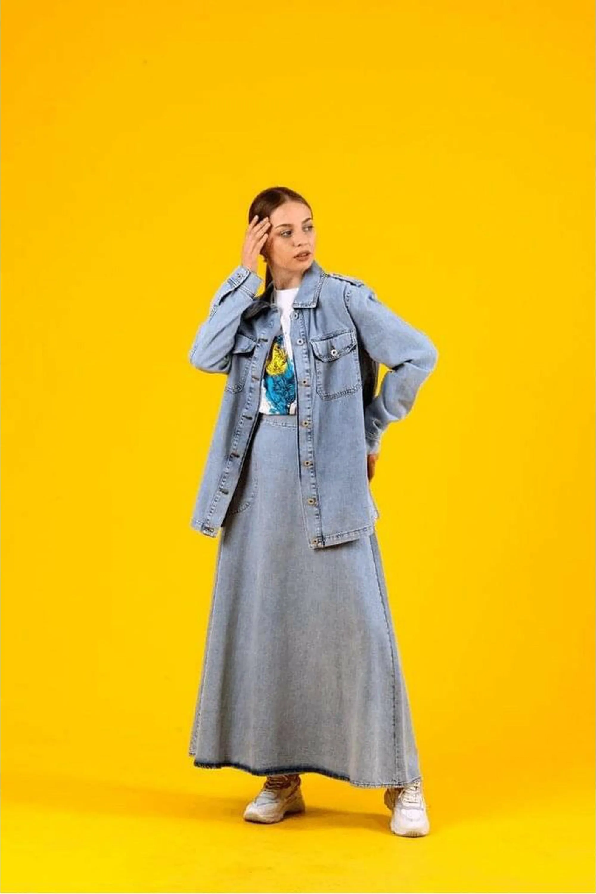Discover effortless elegance with the Alara Denim Skirt Set
